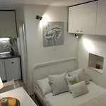 Tiny In Center Stone House *