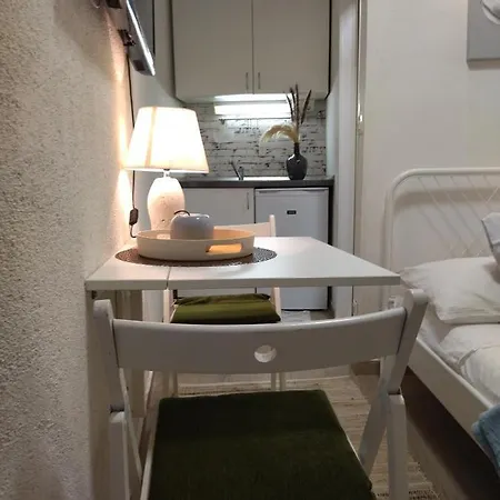 Tiny In Center Stone House *