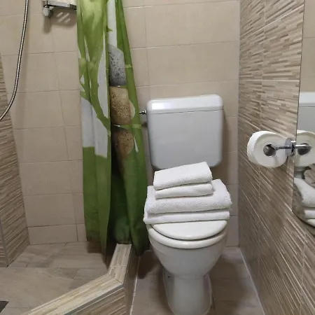 Tiny In Center Stone House *